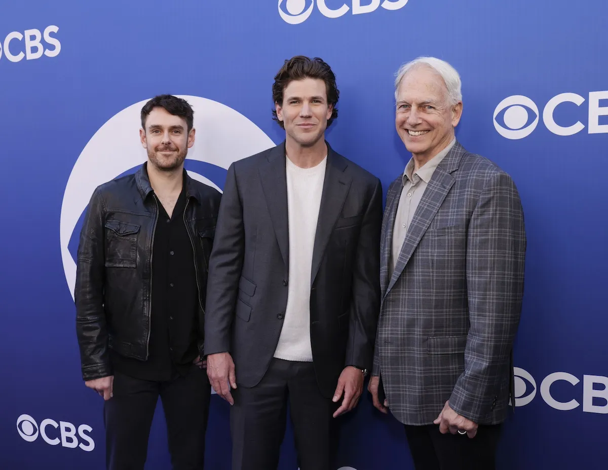 Sean Harmon, Austin Stowell, and Mark Harmon pose for a photo at a CBS event